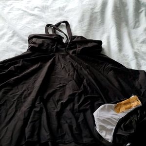 Large swim suit.  Fits around 10/12